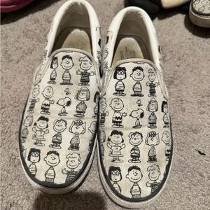 Lacoste Peanuts White Canvas Slip-On Sneakers with Black Character Print